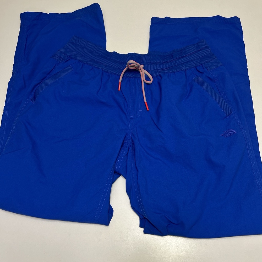 The north face women’s rain, hiking wind pants size large regular fit purple